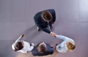 business people shaking hands make deal and sign contract