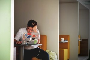 free- Man on Laptop looking for job