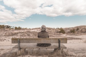 free- man at bench in desert